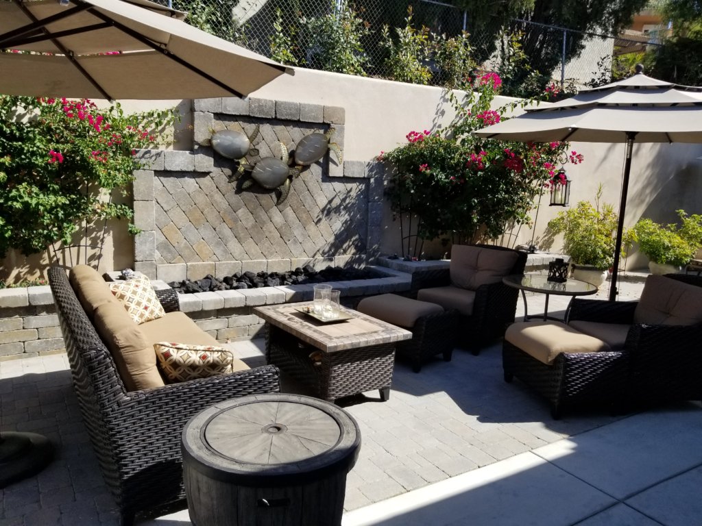 Paver patio with fire pit and wall detail