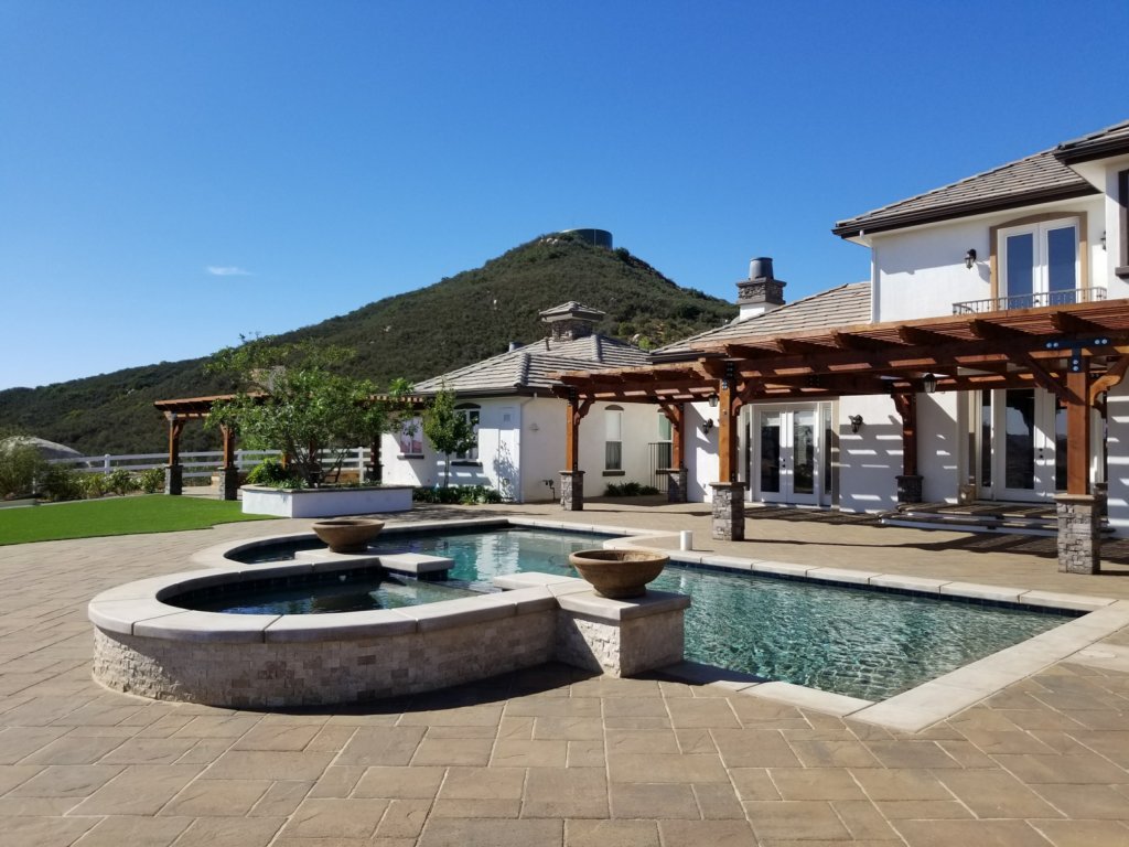 Installed residential landscape with lawn and planting beds