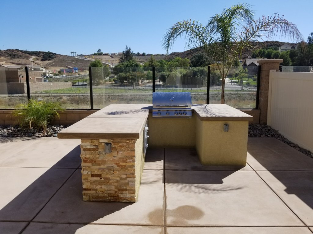 Outdoor room with built-in concrete BBQ